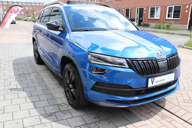 Skoda Karoq 1.5 TSI ACT Sportline Business DSG. Wegklapbare trekhaak, panoramadak