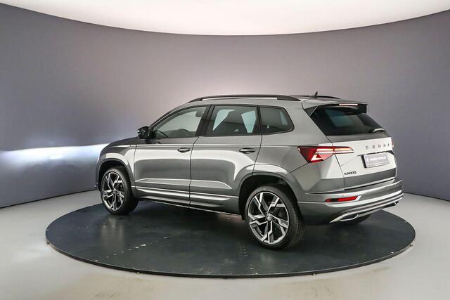 Skoda Karoq Sportline Business 1.5 TSI 150pk DSG Automaat Trekhaak, Adaptive cruise control, Elektrische achterklep, Achteruitrijcamera, Stuurwiel verwarmd, Parkeersensoren, Stoelverwarming