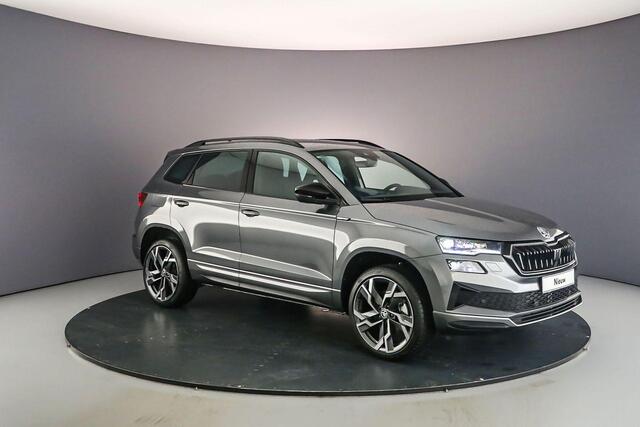 Skoda Karoq Sportline Business 1.5 TSI 150pk DSG Automaat Trekhaak, Adaptive cruise control, Elektrische achterklep, Achteruitrijcamera, Stuurwiel verwarmd, Parkeersensoren, Stoelverwarming