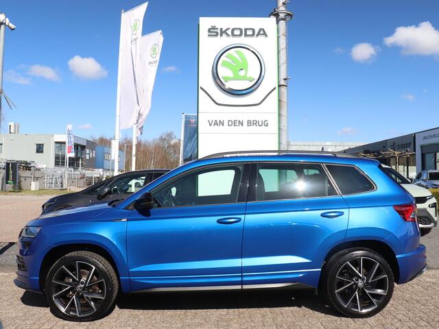 Skoda Karoq Sportline Business 1.5 TSI 150pk AUTOMAAT | Trekhaak | CANTON Audio | Elektrische Achterklep | Adaptieve Cruise Control | Stoel- & Stuurverwarming | Achteruitrijcamera |