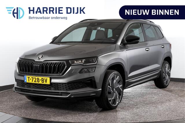 Skoda Karoq 1.5 TSI ACT 150 PK Sportline Business - Automaat | Dig. Cockpit | Adapt. Cruise | Stoel-Stuurverw. | PDC | Camera | NAV + App. Connect | ECC | DAB | Elek. Klep | Afn. Trekhaak | LM 19" |