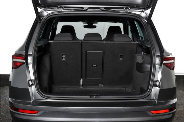 Skoda Karoq 1.5 TSI ACT 150 PK Sportline Business - Automaat | Dig. Cockpit | Adapt. Cruise | Stoel-Stuurverw. | PDC | Camera | NAV + App. Connect | ECC | DAB | Elek. Klep | Afn. Trekhaak | LM 19" |