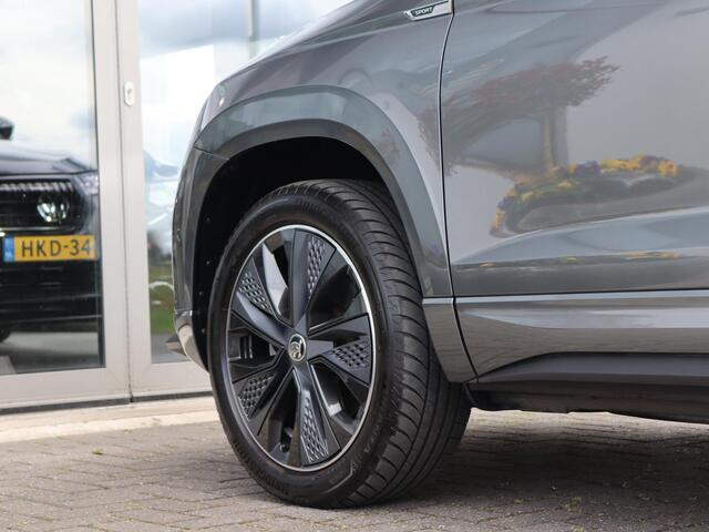 Skoda Karoq 1.5 TSI 150 pk DSG ACT Sportline Business | Navigatie | Keyless | LED | 360° camera | Stoel + Achterbank Verwarming | Voorruit Verwarming | Adaptive Cruise | Stuurverwarming | Standkachel |
