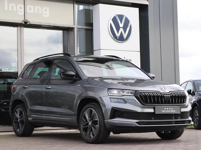 Skoda Karoq 1.5 TSI 150 pk DSG ACT Sportline Business | Navigatie | Keyless | LED | 360° camera | Stoel + Achterbank Verwarming | Voorruit Verwarming | Adaptive Cruise | Stuurverwarming | Standkachel |