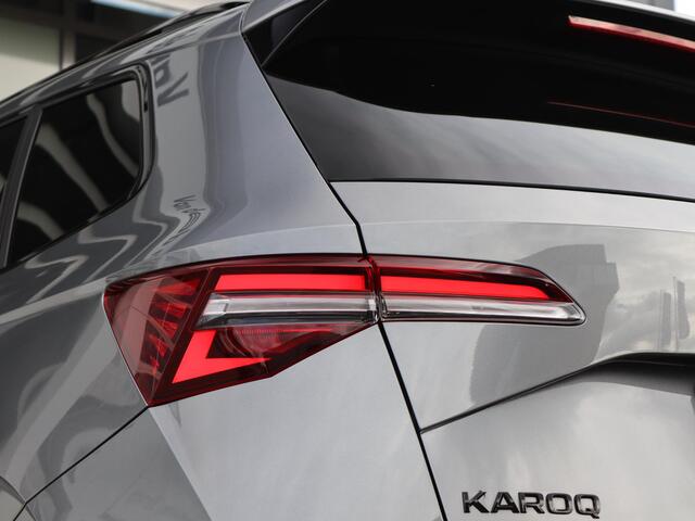 Skoda Karoq 1.5 TSI 150 pk DSG ACT Sportline Business | Navigatie | Keyless | LED | 360° camera | Stoel + Achterbank Verwarming | Voorruit Verwarming | Adaptive Cruise | Stuurverwarming | Standkachel |