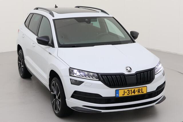Skoda Karoq 1.5 TSI ACT Sportline Business / Digitaal dashboard / Pano / Zwenkbare trekhaak / Parkeersensoren V+A / App connect / Lichtmetaal 19 inch /