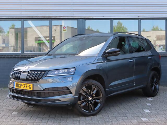 Skoda Karoq 1.5 TSI ACT Sportline Business DSG | trekhaak wegklapbaar | verwarmbare voorstoelen + achterbank | adaptive cruise |