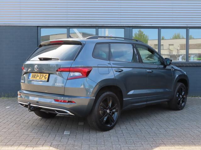 Skoda Karoq 1.5 TSI ACT Sportline Business DSG | trekhaak wegklapbaar | verwarmbare voorstoelen + achterbank | adaptive cruise |