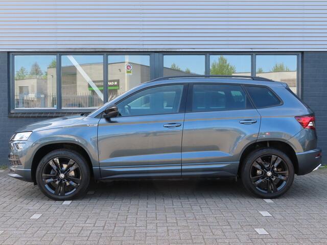 Skoda Karoq 1.5 TSI ACT Sportline Business DSG | trekhaak wegklapbaar | verwarmbare voorstoelen + achterbank | adaptive cruise |