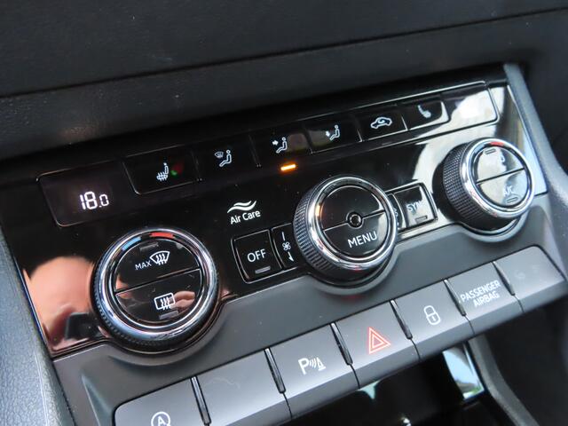 Skoda Karoq 1.5 TSI ACT Sportline Business DSG | trekhaak wegklapbaar | verwarmbare voorstoelen + achterbank | adaptive cruise |