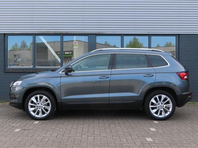 Skoda Karoq 1.5 TSI ACT Style DSG | trekhaak wegklapbaar | verwarmbare voorruit | elektrisch verstelbare stoel + geheugen | stoel + stuurwielverwarming | groot navi