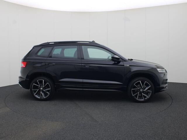 Skoda Karoq 1.5TSI/150PK ACT Sportline DSG · Panoramadak · Trekhaak · Camera + Parkeersensoren · Garantie tot februari 2026 of 90000km