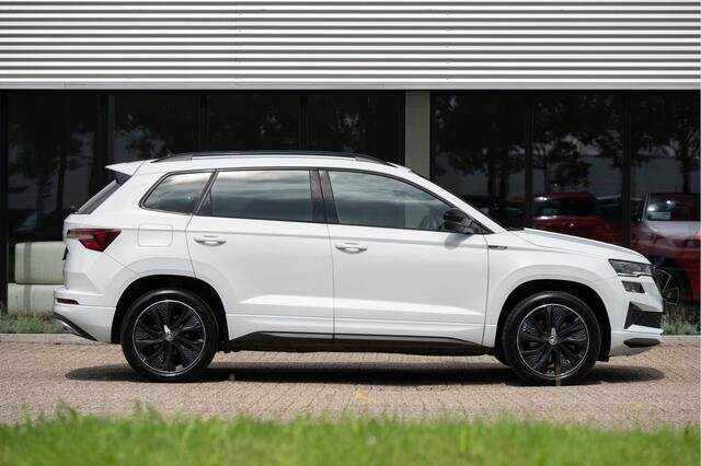 Skoda Karoq 1.5 TSI ACT Sportline Business | Adapt. Cruise | Elek. Trekhaak | DCC | Virtual | Navi | Apple CarPlay