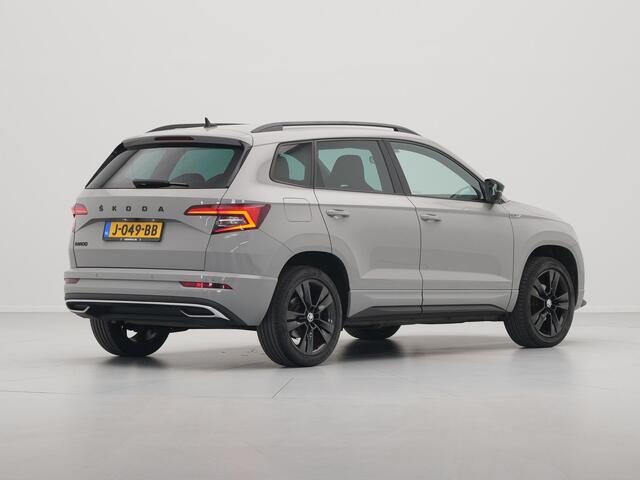 Skoda Karoq 1.5 TSI ACT 150pk DSG Sportline Business Navigatie CantonSound Stoelverwarming Camera Carplay Sideassist