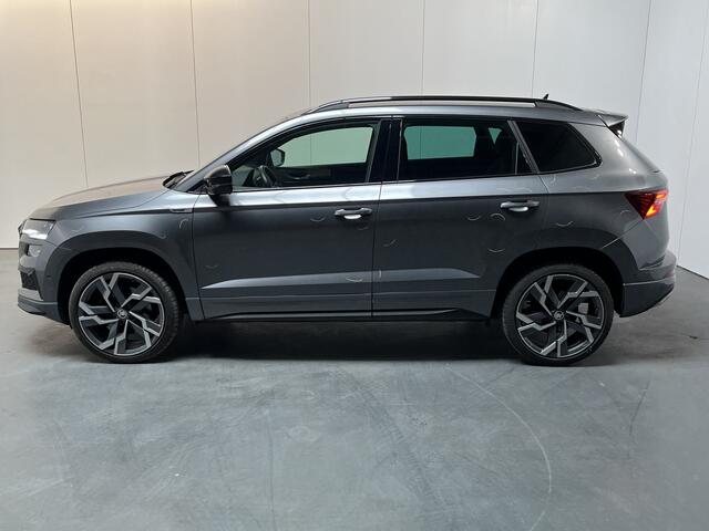 Skoda Karoq 1.5 TSI ACT Sportline Business / AUTOMAAT/ 360 CAMERA/ PARK. SENSOREN/ KEYLESS/ CRYSTAL LIGHTING/ STOEL-STUURVERWARM./ VIRTUAL COCKPIT/ ADAPT. CRUISE/ SMARTLINK/ NAVI/ CLIMA/ DAB/ 19" LMV