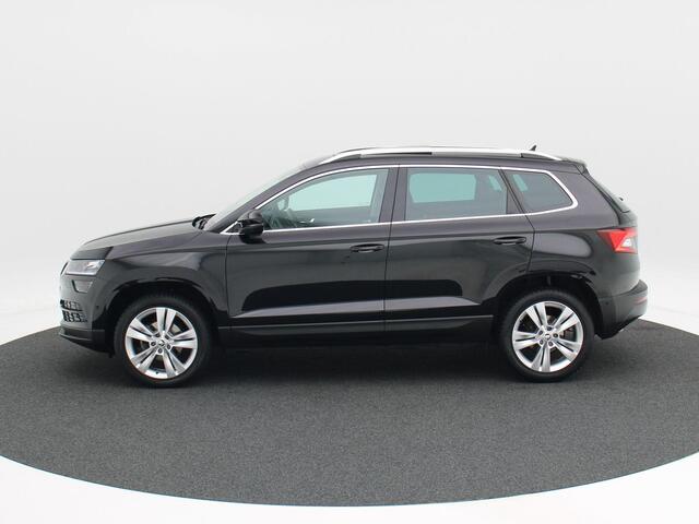 Skoda Karoq 1.5 TSi 150 Pk Automaat Style Business | Panoramadak | Trekhaak | Canton Audio | Adaptive Cruise | Stoel Verwarming | Carplay | Camera | 18 Inch | 75.460 Km!