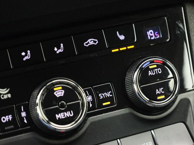 Skoda Karoq 1.5 TSI ACT Ambition DSG · Navigatie · Camera + Parkeersensoren · Stoelverwarming