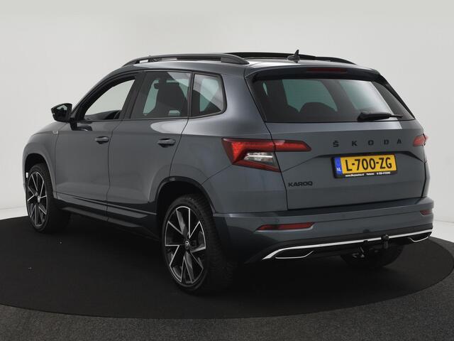 Skoda Karoq 1.5 TSI 150PK ACT Sportline Business AUTOM. TREKH|PANODAK|ELEK.ACHTERKLEP|STOEL+STUURVERW|LED|CAMERA|19INCH|NAVI