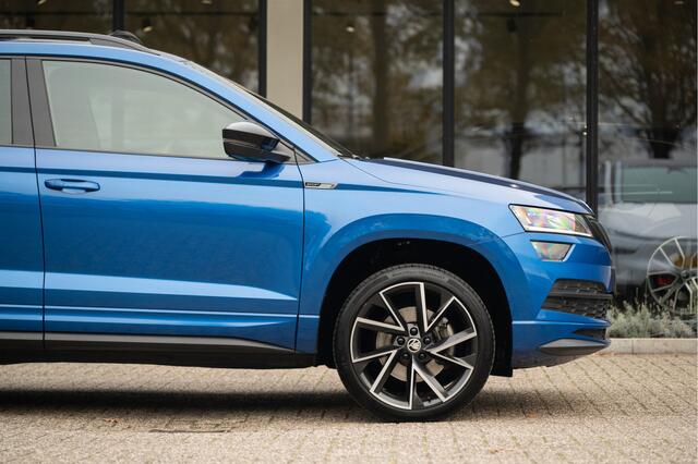 Skoda Karoq 1.5 TSI ACT Sportline Business | Pano | Adapt. Cruise | Elek. Achterklep | 19" | Camera | Navi | Apple Carplay