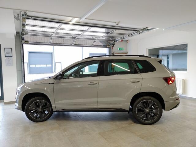 Skoda Karoq 1.5 TSI DSG SPORTLINE TREKHAAK/CAMERA/CARPLAY/ACC/STOELVERW/E-KLEP