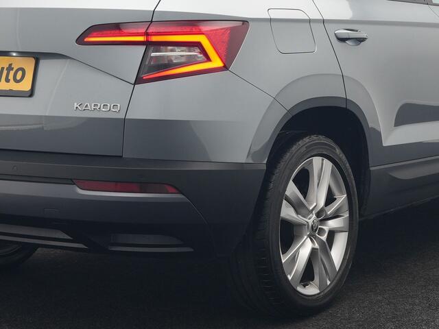 Skoda Karoq 1.0 TSI Style DSG116pk Dealer O.H. | Trekhaak Af Fabriek | Panodak | Camera | Apple Carplay | Sportstoelen Verwarmd | Navigatie | Keyless | Cruise Control | DAB |