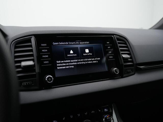 Skoda Karoq 1.5 TSI ACT 150 pk DSG Sportline Business | Canton | Stuur-/stoelverwarming | Achteruitrijcamera | Navigatie | Adaptive Cruise