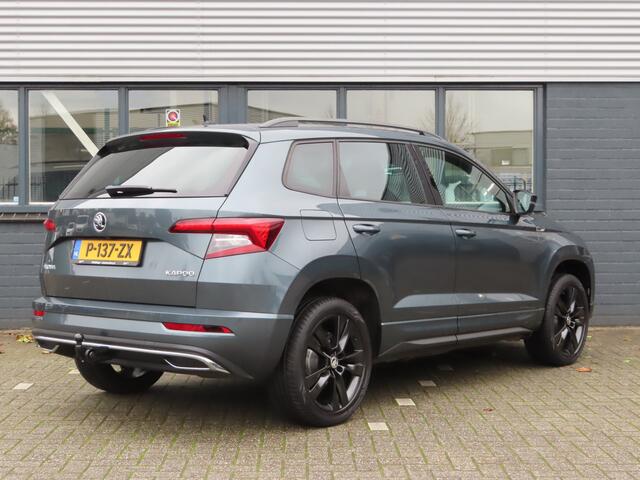 Skoda Karoq 1.5 TSI ACT Sportline Business DSG | trekhaak wegklapbaar | stoel + stuurwielverwarming | camera | elektrische achterklep