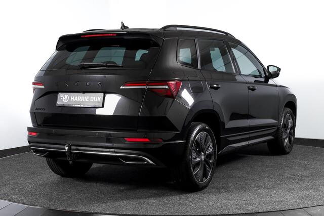 Skoda Karoq 1.5 TSI ACT Sportline Business 150 PK - Automaat | Elek. Trekhaak | Dig. Cockpit | Adapt. Cruise | PDC | Camera | NAV + App. Connect | ECC | DAB | LM 18" | 7979