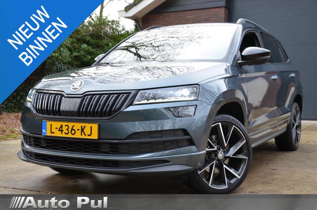 Skoda Karoq 1.5 TSI ACT Sportline Business Automaat/Navi/Led/Pdc/Ecc/Stoel & stuurverwarming/Virtual Cockpit/Achteruitrijcamera/Cr-Control adaptief/Privacy-Glass/wegklapbare Trekhaak