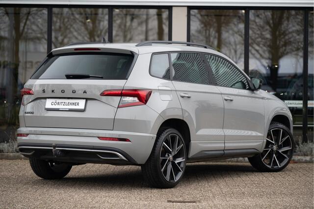 Skoda Karoq 1.5 TSI ACT Sportline Business | Trekhaak | Adapt. Cruise | Camera | 19" | Winterpakket