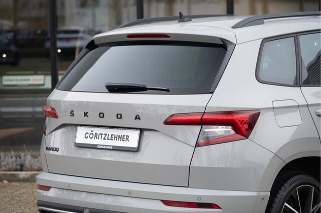 Skoda Karoq 1.5 TSI ACT Sportline Business | Trekhaak | Adapt. Cruise | Camera | 19" | Winterpakket