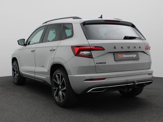 Skoda Karoq 1.5 TSI ACT Sportline Business 150PK DSG Trekhaak, Canton Audio, 19" LM Velgen, Elektr. Achterklep, Keyless, Adaptieve Cruise Controle, Achteruitrijcamera, Side Assist, Stoelverwarming, Voorruitverwarming