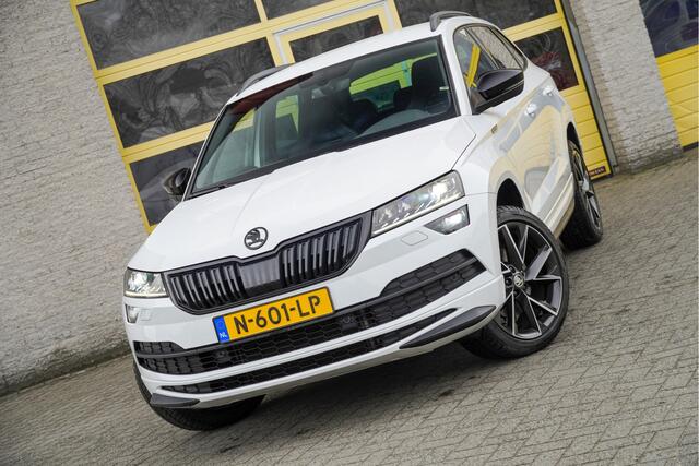 Skoda Karoq 1.5 TSI ACT 150PK! Automaat Sportline Business BJ2021 Lmv 19" | Led V+A | Pdc | Navi | Keyless entry | Elek. achterklep | Achteruitrijcamera | App-Connect | Virtual cockpit | Canton audio | | Sportstoelen | Verwarmde voorstoelen/stuurwiel | Zwarte hemel
