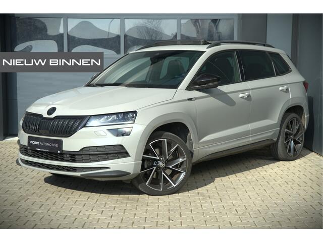 Skoda Karoq 1.5 TSI ACT Sportline Business | Panoramadak | Stoelverwarming | Stuurverwarming | Canton | Keyless | Apple Carplay | Camera | Adaptive Cruise Control | Dodehoekdetectie
