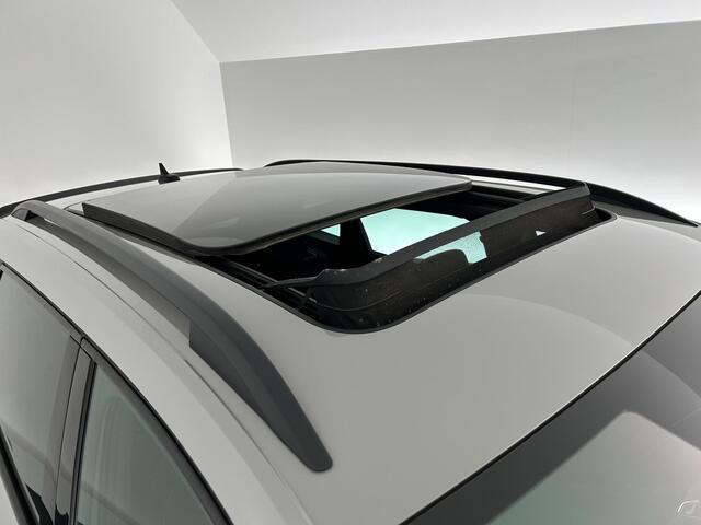 Skoda Karoq 1.5 TSI 150pk DSG ACT Sportline Business Trekhaak Camera Canton Keyless Virtual Cockpit Stoelverwarming Navigatie