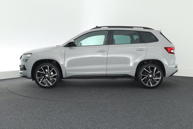 Skoda Karoq 1.5 TSI 150pk DSG ACT Sportline Business Trekhaak Camera Canton Keyless Virtual Cockpit Stoelverwarming Navigatie