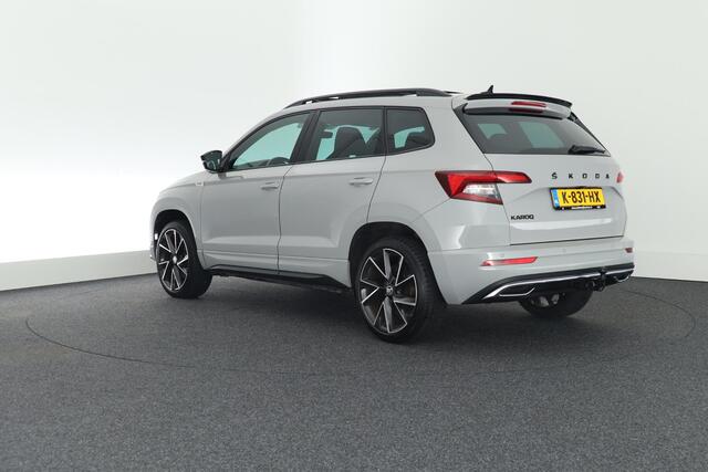 Skoda Karoq 1.5 TSI 150pk DSG ACT Sportline Business Trekhaak Camera Canton Keyless Virtual Cockpit Stoelverwarming Navigatie