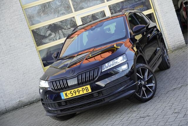 Skoda Karoq 150PK! Automaat Sportline Business BJ2021 | Lmv 19" | Led V+A | Keyless entry | Pdc V+A | Panoramadak | Elek. trekhaak | Verwarmde voorruit | Achteruitrijcamera | App-Connect | Navi | Virtual cockpit | Voorstoelen verwarmd/stuur