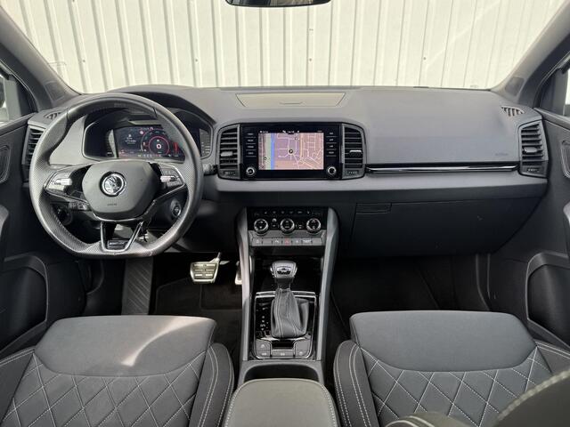 Skoda Karoq 1.5 TSI ACT Sportline Business / Nederlandse Auto / Dealer Onderhouden / All Seasonbanden / Trekhaak 1500 KG / Navigatie / Stoel- en Stuurverwarming / Adaptive Cruise Control / Voorruitverwarming / Climate Control /