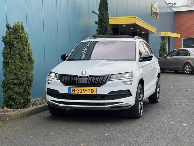 Skoda Karoq 1.5 TSI DSG AUT. Sportline Business PANO | CANTON.AUDIO | CARPLAY | TREKH.ELEK | STUUR/STOELVERW | DIGI.DASHB | ADAPT.CRUISE | CAM | LED | NAV | PDC | LMV
