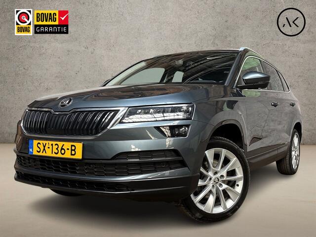 Skoda Karoq 1.0 TSI Sport Automaat (PANORAMADAK, APPLE CARPLAY, GROOT NAVI, CLIMATE, CAMERA, STOELVERWARMING, SPORTSTOELEN, GETINT GLAS, ADAPTIVE CRUISE, NIEUWE APK, NIEUWSTAAT)
