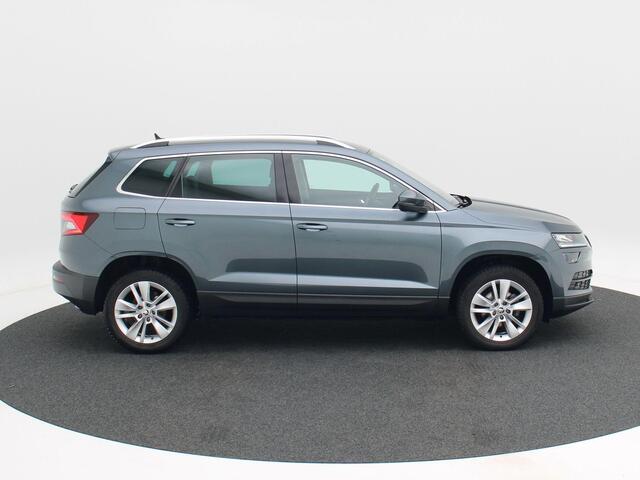 Skoda Karoq 1.5 TSi 150 Pk Automaat Business Edition Plus | Trekhaak | Camera | Stoelverwarming | Adaptive Cruise | CarPlay | 17 Inch