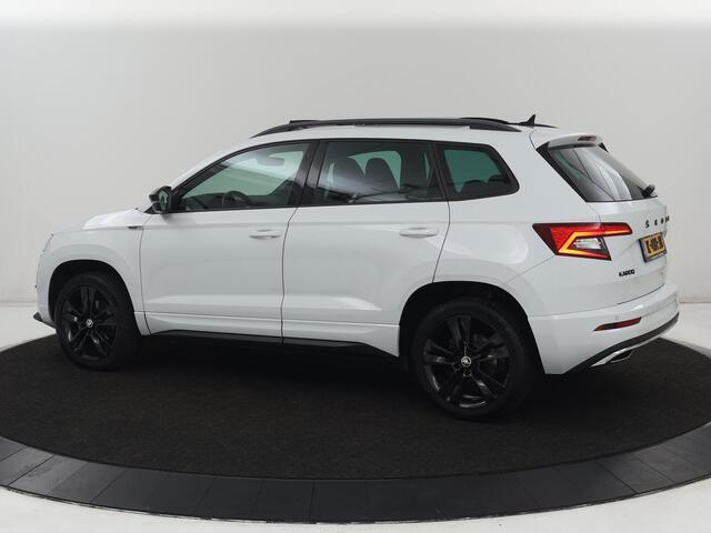 Skoda Karoq 1.5 TSI Sportline | Panoramadak | Stoelverwarming | Adaptive cruise | Camera | Sportstoelen | Virtual Cockpit | Navigatie | Sfeerverlichting | Full LED | 18'' | Keyless | Climate control