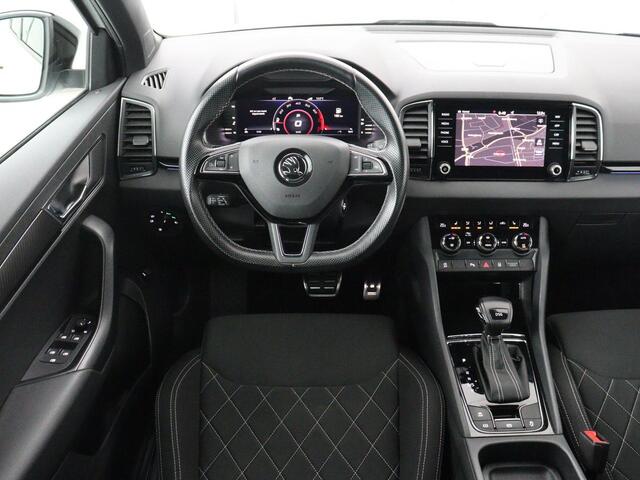 Skoda Karoq 1.5 TSI Sportline | Panoramadak | Stoelverwarming | Adaptive cruise | Camera | Sportstoelen | Virtual Cockpit | Navigatie | Sfeerverlichting | Full LED | 18'' | Keyless | Climate control