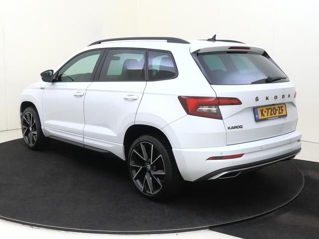 Skoda Karoq 1.5 TSI ACT Sportline Business | CANTON audio | Achteruitrijcamera | Cruise control | CarPlay | Keyless | Navigatie | Stoel- en stuurwielverwarming |