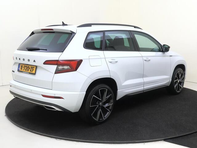 Skoda Karoq 1.5 TSI ACT Sportline Business | CANTON audio | Achteruitrijcamera | Cruise control | CarPlay | Keyless | Navigatie | Stoel- en stuurwielverwarming |