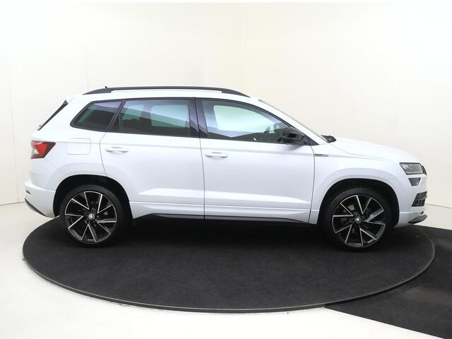Skoda Karoq 1.5 TSI ACT Sportline Business | CANTON audio | Achteruitrijcamera | Cruise control | CarPlay | Keyless | Navigatie | Stoel- en stuurwielverwarming |