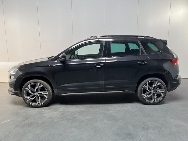Skoda Karoq 1.5 TSI ACT Sportline / AUTOMAAT/ PANO/ TREKHAAK/ DCC/ STUUR+STOELVERWARM./ ACC/ PARK.SENSOR.V+A/ CAMERA/ SMARTLINK/ KEYLESS/ DIGITAL DASH/ NAVI/ DAB/ CLIMA/ LED/ 19'' LMV
