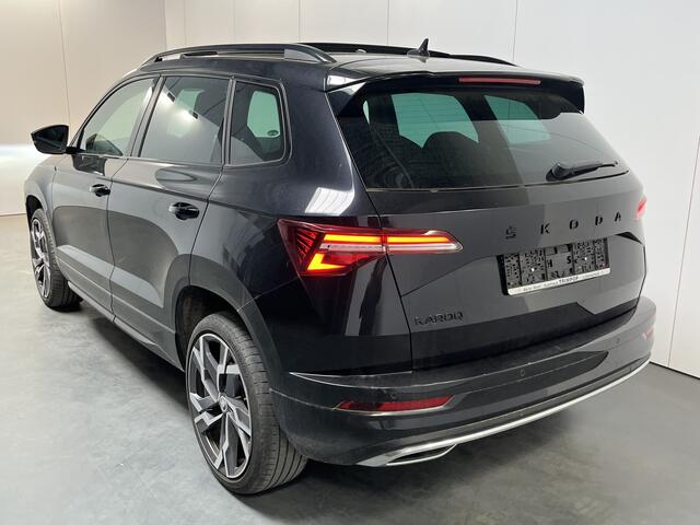 Skoda Karoq 1.5 TSI ACT Sportline / AUTOMAAT/ PANO/ TREKHAAK/ DCC/ STUUR+STOELVERWARM./ ACC/ PARK.SENSOR.V+A/ CAMERA/ SMARTLINK/ KEYLESS/ DIGITAL DASH/ NAVI/ DAB/ CLIMA/ LED/ 19'' LMV