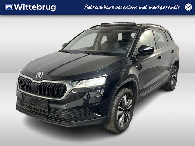 Skoda Karoq 1.0 TSI Ambition Tour / PANODAK/ KEYLESS/ STOELVERWARMING V&A/ DIGITAL DASH/ CRUISE/ SMARTLINK/ NAV/ CLIMA/ PARK. SENSOREN + CAMERA